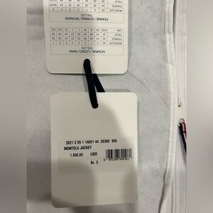 Montcla puffer , embroidered logo on the inside of jacket . Sz (3) L